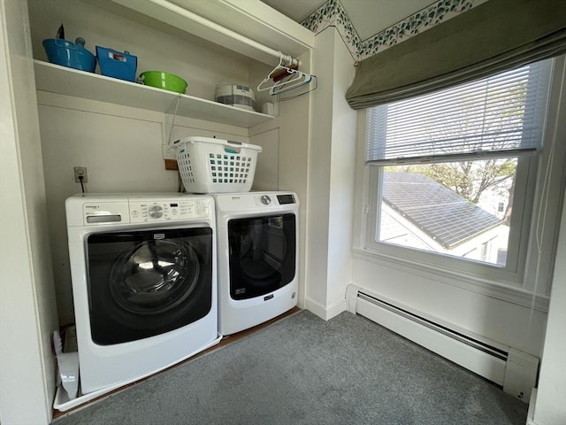 laundry room with a baseboard radiator, washing machine and clothes dryer, laundry area, and carpet floors