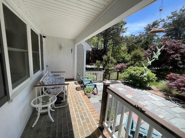 balcony featuring a porch
