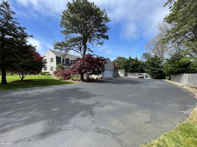 exterior space with aphalt driveway