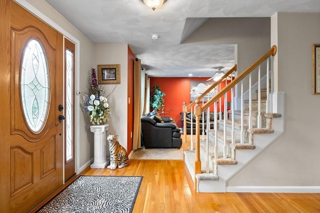 7 Suzannah Rd, Billerica, MA 01862 - foyer featuring stairs, wood finished floors, and ceiling fan