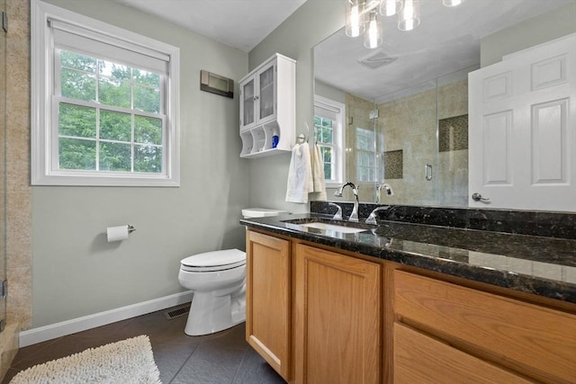 7 Suzannah Rd, Billerica, MA 01862 - bathroom with tile patterned floors, vanity, a stall shower, and a chandelier