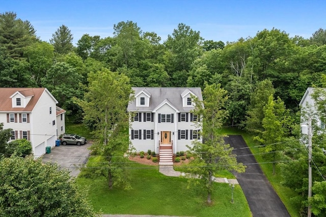 7 Suzannah Rd, Billerica, MA 01862 - view of front facade featuring a wooded view and asphalt driveway