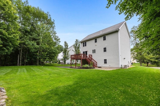 7 Suzannah Rd, Billerica, MA 01862 - rear view of house featuring stairs, a deck, and a lawn