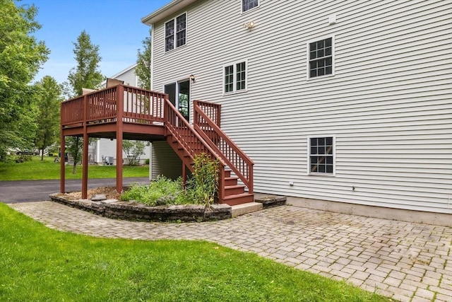 7 Suzannah Rd, Billerica, MA 01862 - back of house with a deck, a patio area, stairs, and a lawn