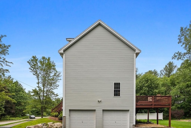 7 Suzannah Rd, Billerica, MA 01862 - view of home's exterior with an attached garage and a wooden deck