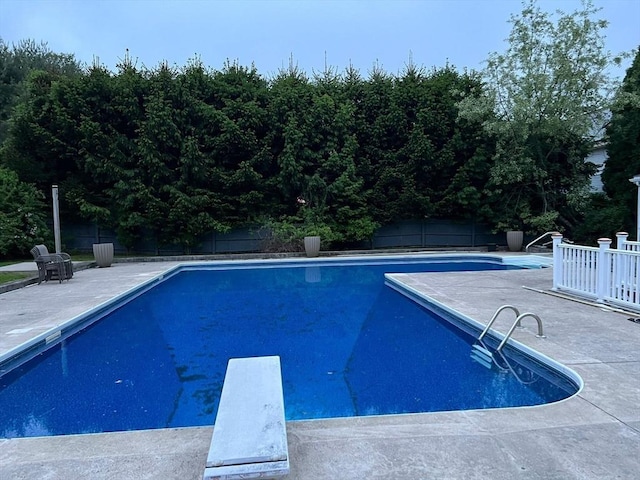4 Mark Ln, Milton, MA 02186 - view of pool with a fenced backyard, a diving board, and a patio