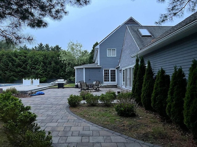 4 Mark Ln, Milton, MA 02186 - back of property with a patio area