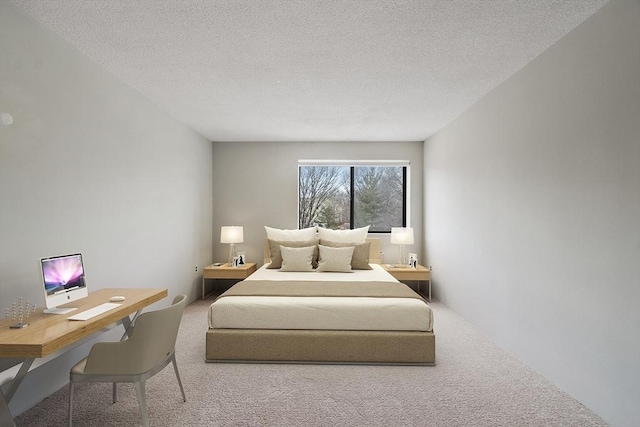 carpeted bedroom with a textured ceiling