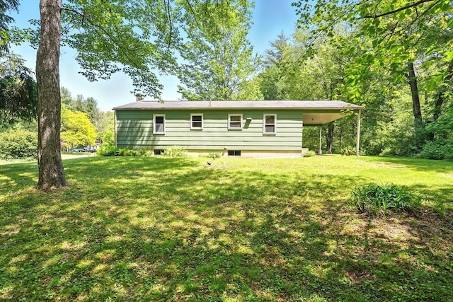 161 Farmington Rd, Amherst, MA 01002 - rear view of property with a lawn