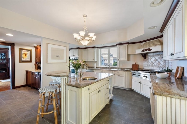 2 Bluff Rd, Hull, MA 02045 - kitchen featuring a sink, light stone countertops, a chandelier, and recessed lighting
