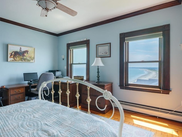 2 Bluff Rd, Hull, MA 02045 - bedroom featuring wood finished floors, ornamental molding, a baseboard heating unit, and a ceiling fan