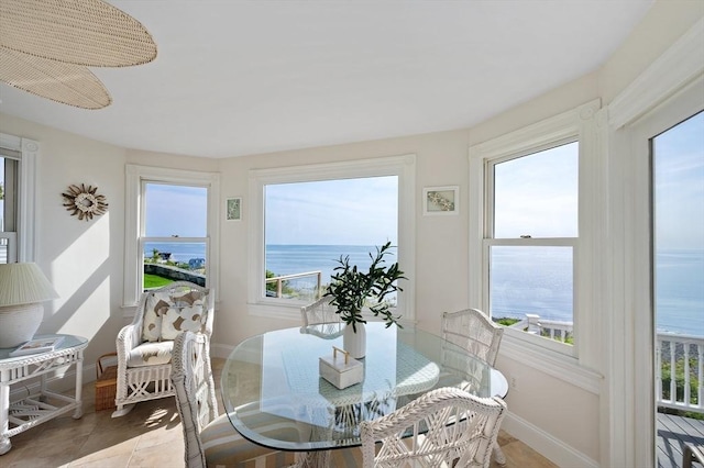 2 Bluff Rd, Hull, MA 02045 - sunroom / solarium featuring a water view and baseboards