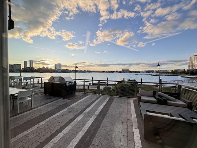 deck at dusk with a water view