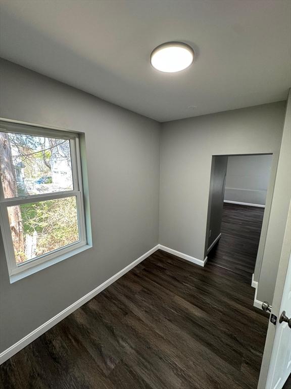32 Main St, Monson, MA 01057 - spare room featuring dark wood-style flooring