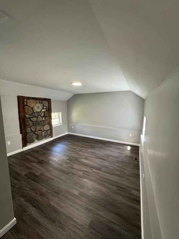 32 Main St, Monson, MA 01057 - additional living space featuring vaulted ceiling and dark wood-type flooring