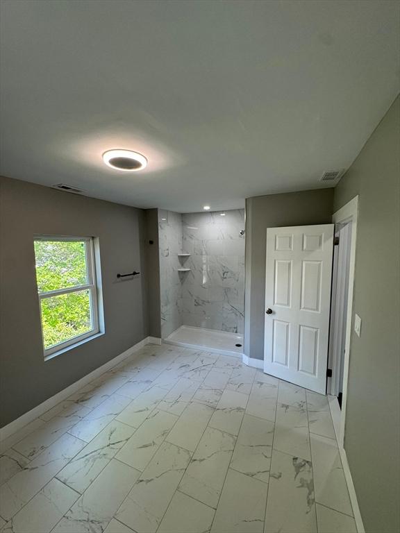 32 Main St, Monson, MA 01057 - unfurnished room with light marble finish flooring and baseboards