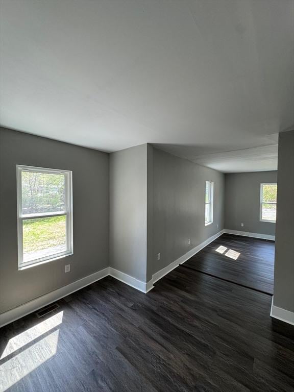 32 Main St, Monson, MA 01057 - empty room with dark wood-type flooring