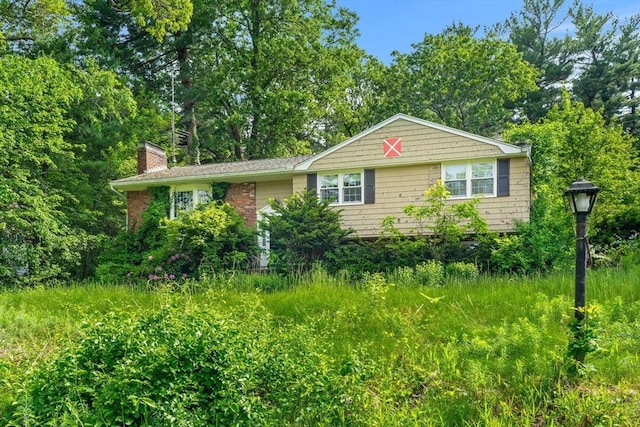 445 Salem St, North Andover, MA 01845 - view of front facade featuring a chimney