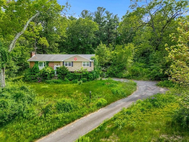 445 Salem St, North Andover, MA 01845 - single story home with a chimney and a wooded view