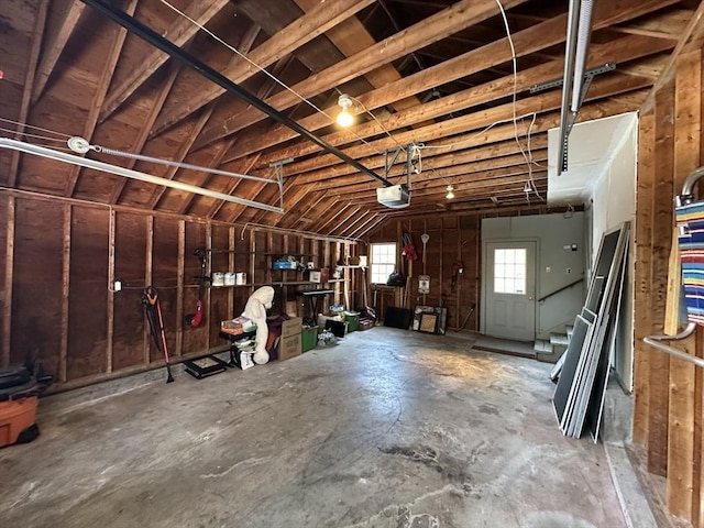 garage featuring a garage door opener