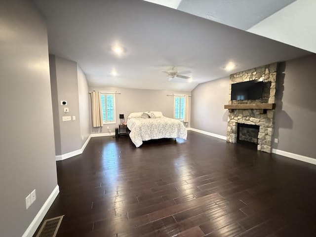 18 Preserve Way, Sturbridge, MA 01566 - bedroom featuring baseboards, wood finished floors, a stone fireplace, and lofted ceiling