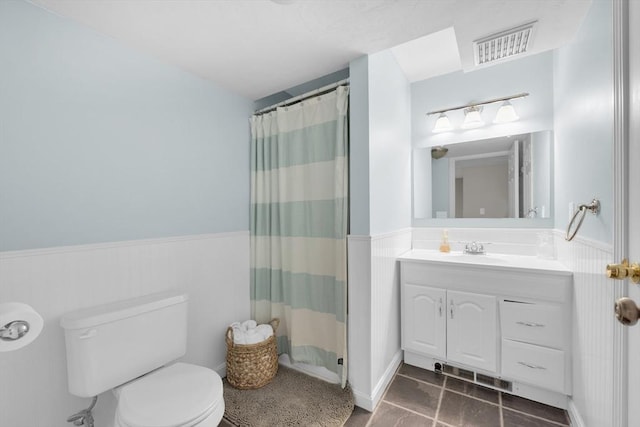 18 Preserve Way, Sturbridge, MA 01566 - full bath with toilet, vanity, wainscoting, and curtained shower