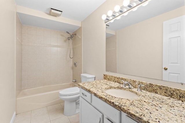 bathroom featuring toilet, tile patterned floors, bathing tub / shower combination, and vanity