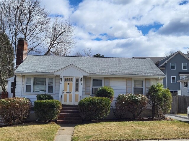 24 Neillian Cres, Boston, MA 02130 - view of front facade with a chimney and a shingled roof