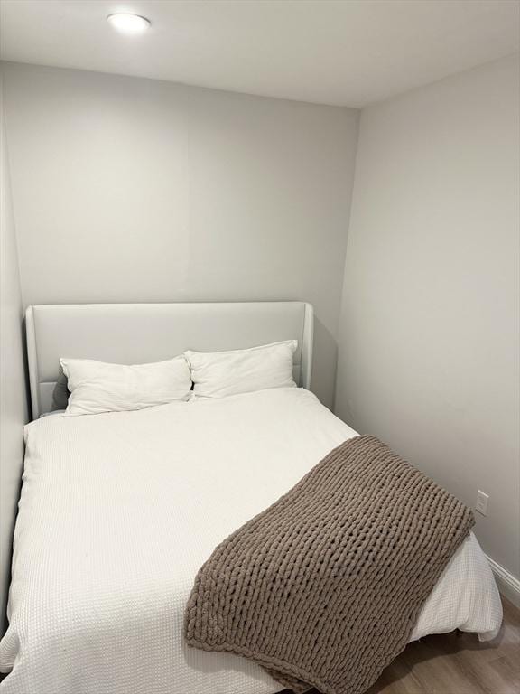 bedroom featuring hardwood / wood-style flooring