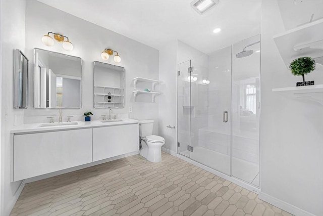 191 Washington St Unit 318, Boston, MA 02135 - full bathroom with a shower stall, double vanity, toilet, and baseboards