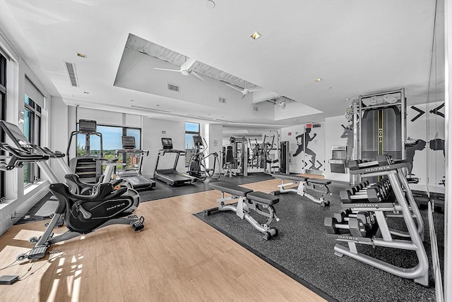 191 Washington St Unit 318, Boston, MA 02135 - exercise room with plenty of natural light and wood finished floors