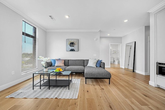 191 Washington St Unit 318, Boston, MA 02135 - living room featuring ornamental molding, baseboards, light wood-style floors, and recessed lighting