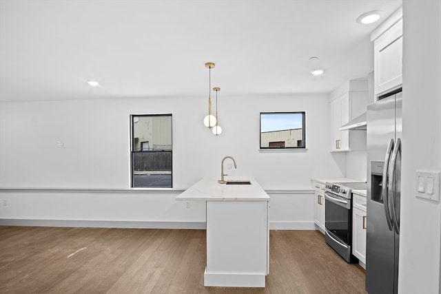 kitchen with white cabinets, pendant lighting, a kitchen island with sink, dark wood-type flooring, and appliances with stainless steel finishes