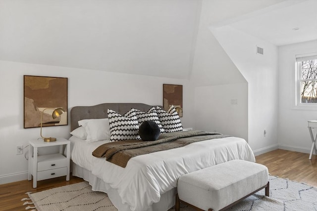 bedroom with light wood-type flooring