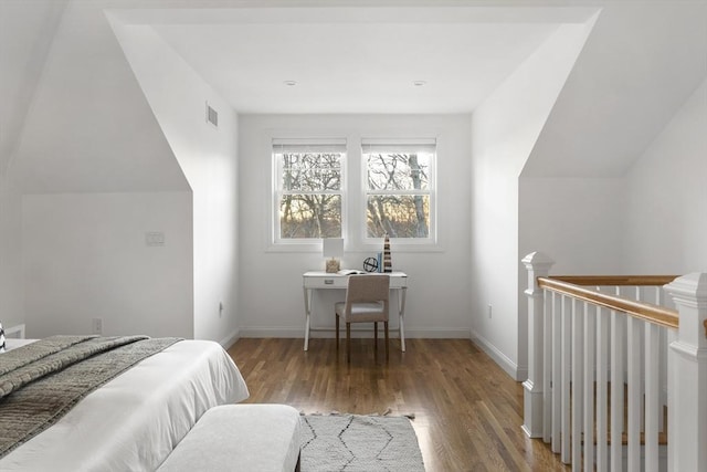 bedroom featuring dark hardwood / wood-style floors