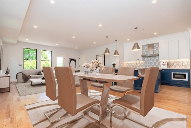 dining space featuring light hardwood / wood-style flooring