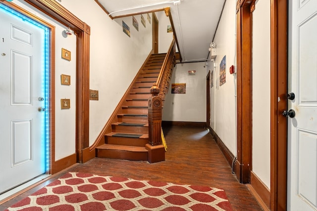 entrance foyer featuring dark hardwood / wood-style floors