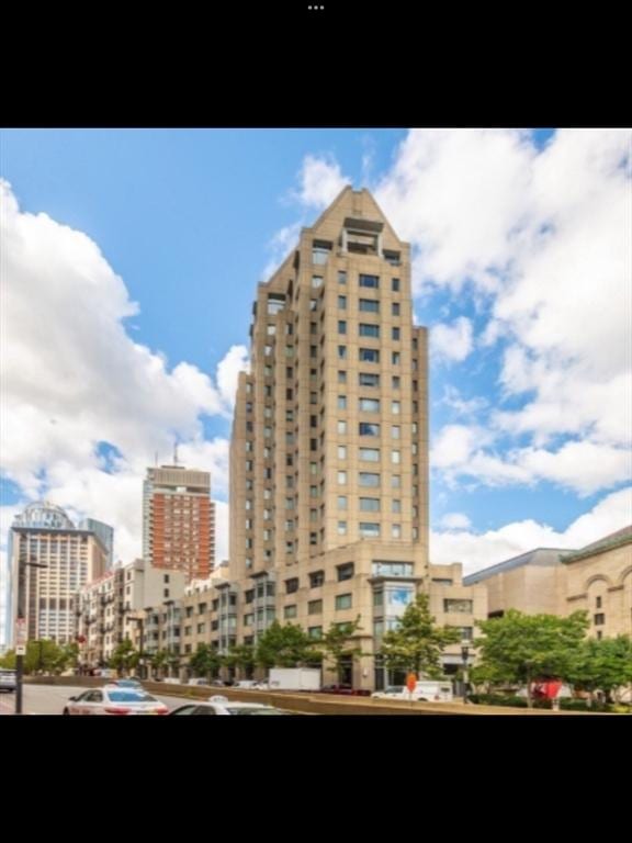 view of building exterior featuring a city view