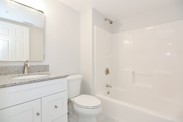 full bathroom with vanity, bathing tub / shower combination, toilet, and tile patterned flooring