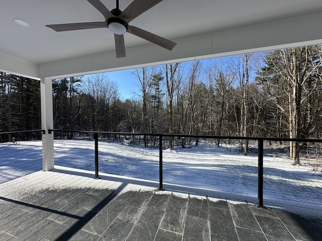 exterior space with ceiling fan