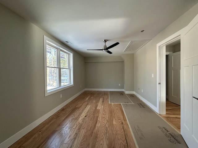 interior space with light wood-type flooring and ceiling fan