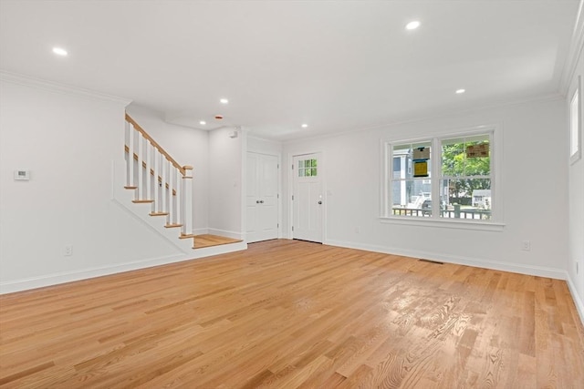 13 River Unit 2, Danvers, MA 01923 - foyer with light wood-style flooring, crown molding, stairs, and recessed lighting