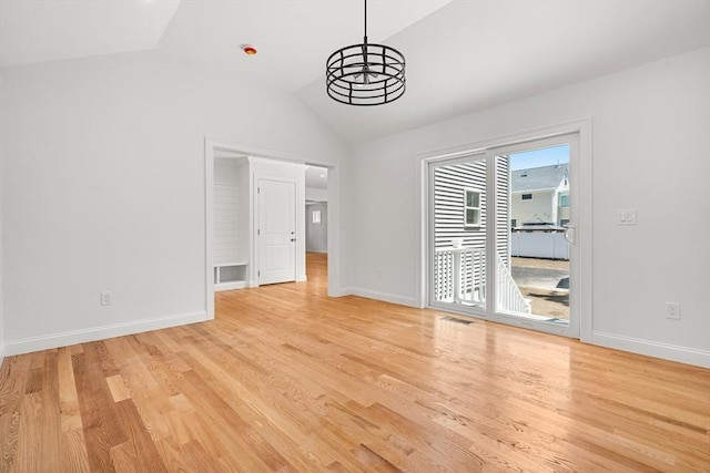 13 River Unit 2, Danvers, MA 01923 - unfurnished dining area with lofted ceiling and light wood-type flooring