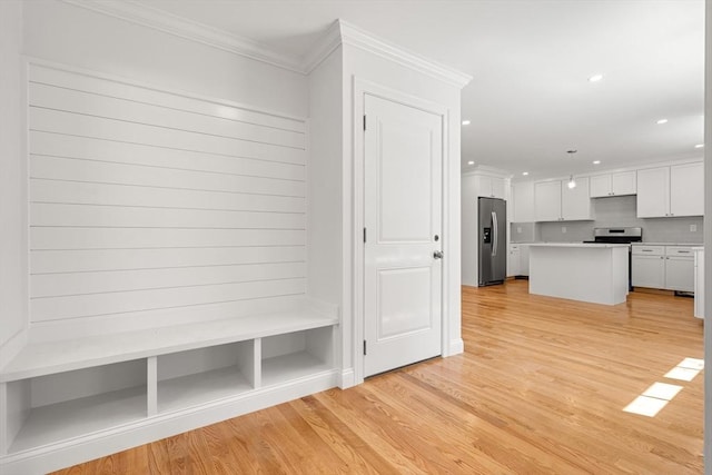 13 River Unit 2, Danvers, MA 01923 - mudroom with ornamental molding, recessed lighting, and light wood-style flooring