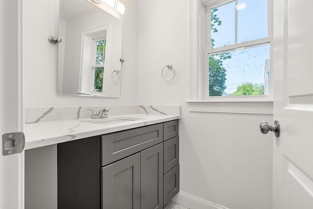 13 River Unit 2, Danvers, MA 01923 - bathroom with vanity and healthy amount of natural light