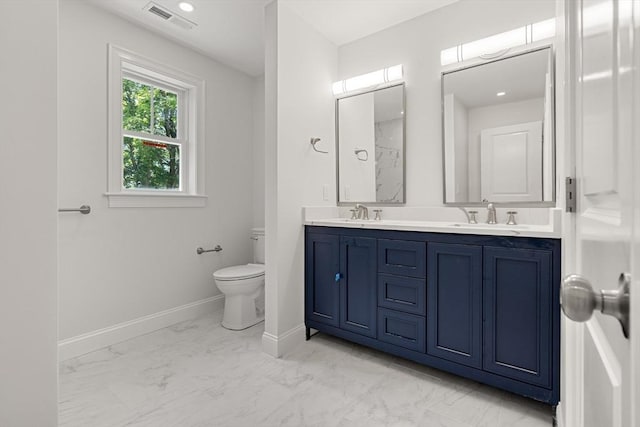 13 River Unit 2, Danvers, MA 01923 - bathroom featuring double vanity and marble finish floors