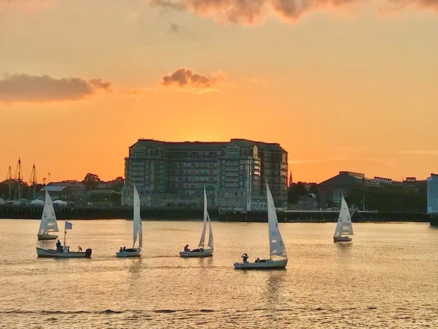 view of home's community with a water view