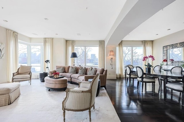 living room with dark hardwood / wood-style flooring