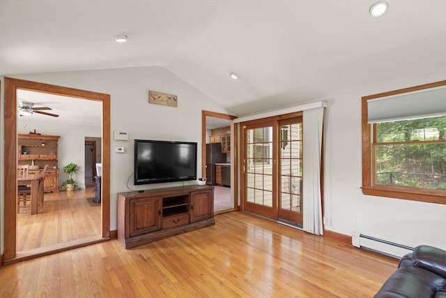 10 Powderhouse Cir, Wilmington, MA 01887 - living area featuring a baseboard radiator, vaulted ceiling, light wood-style flooring, a ceiling fan, and baseboards