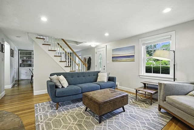 7 Vermont Ave, Natick, MA 01760 - living area featuring light wood-type flooring, stairway, and recessed lighting